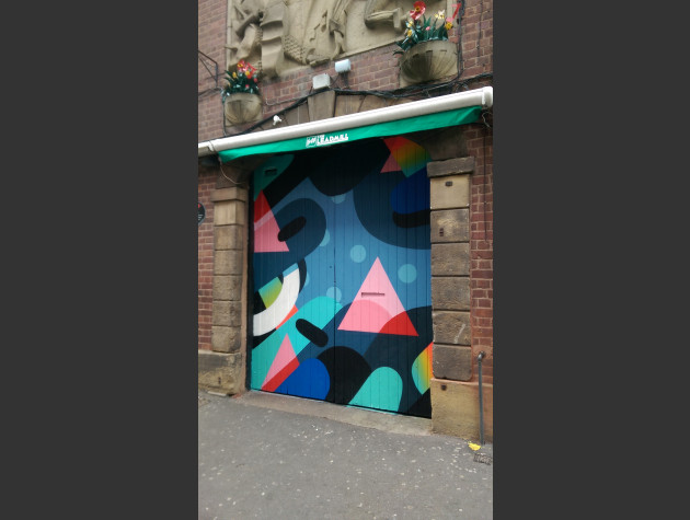 Doors to the Leadmill painted with colourful abstract shapes